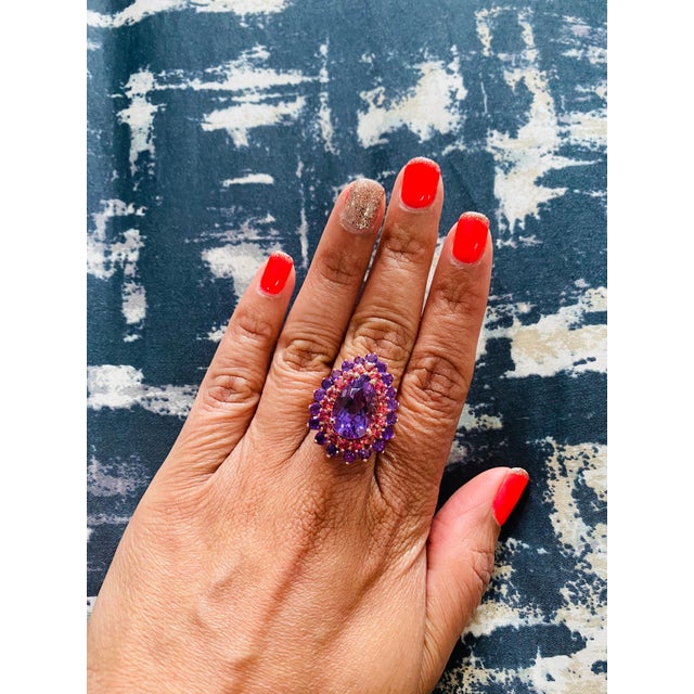 8.90 Carat Pear Cut Amethyst Sapphire 14 Karat Rose Gold Cocktail Ring! This beautiful ring has a 5.61 Carat Pear Cut...