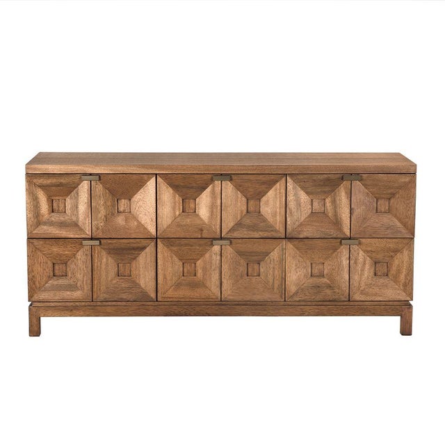 This six-drawer cabinet in Dark Walnut features six faceted, pyramidal drawer fronts that add sculptural depth and...