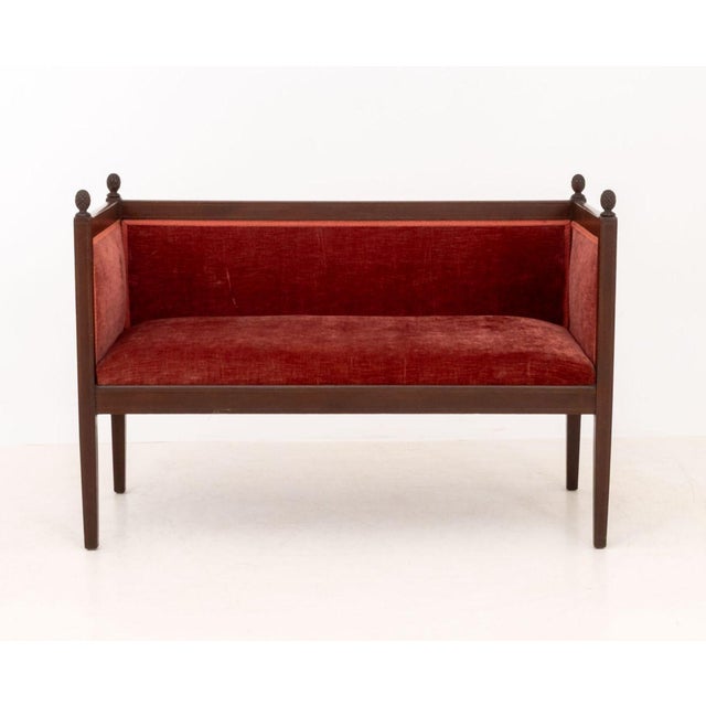 Louis XVI Style Red Velvet Upholstered Mahogany Sofa, with pinecone carvings. 31" H x 45" W x 21" D. Provenance: The...