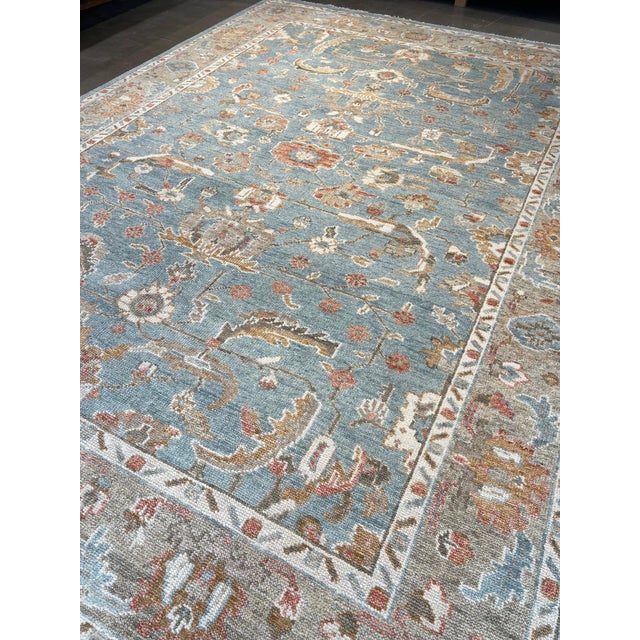 A replication of antique Mahal design rugs.