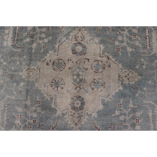 Antique Turkish Oushak Rug With Medallion With Light Gray-Blue, Cream, and Brown For Sale - Image 10 of 12