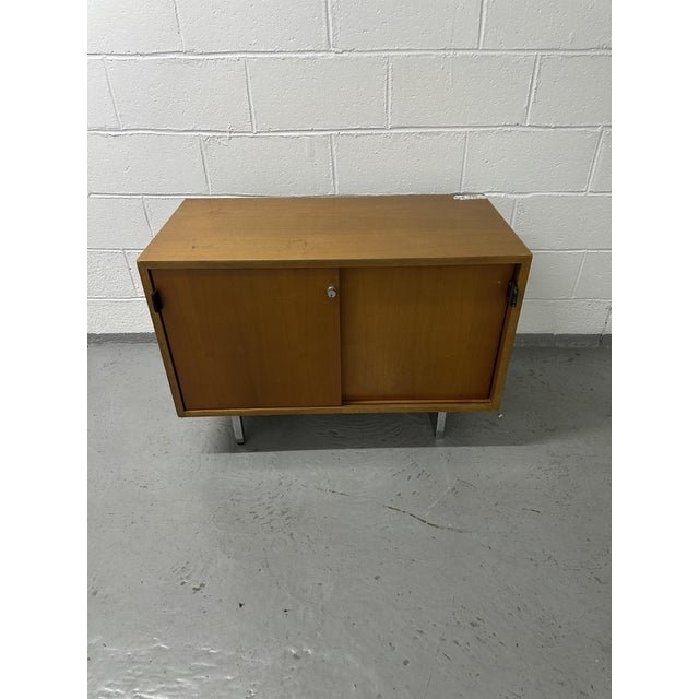 Small teak sideboard by Florence Knoll, dating from the 1970s. Knoll labels present (see photos). The lock works and the...