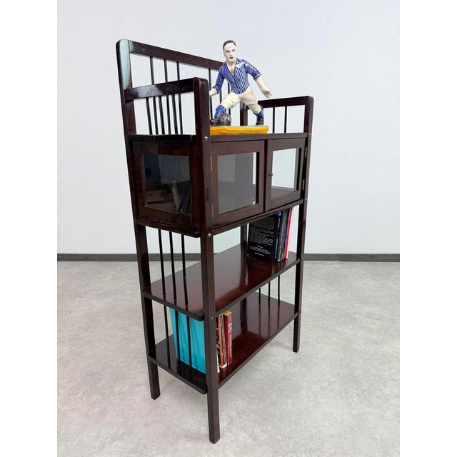 A highly collectible and beautifully crafted antique etagere / display shelf, manufactured in Austria by the famous...