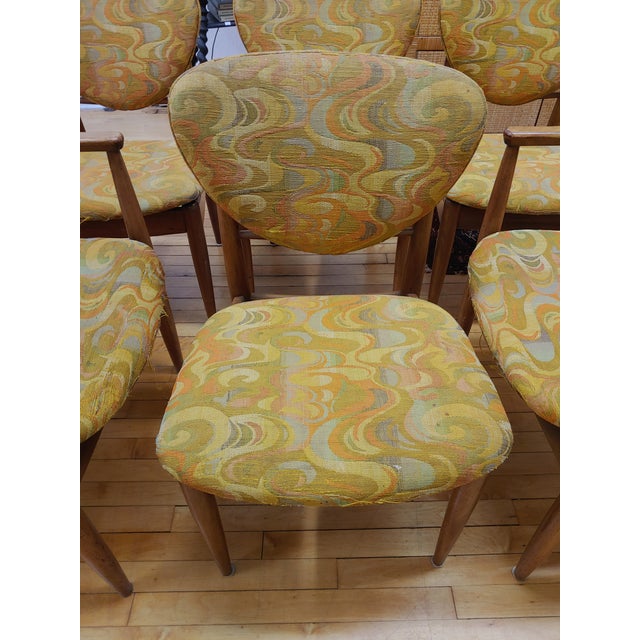 Here's a set of six dining chairs in the style of Finn Juhl for John Stuart. These embody the Danish Modern style of the...