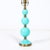 This Mid-Century Modernist table lamp, hand-blown in Murano, Italy, is a brilliant example of 20th-century Venetian glass...