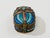 Finely detailed champlevé scarab shape box with gilt wash interior. Traces of antique mirror on inner top. Rich colors of...