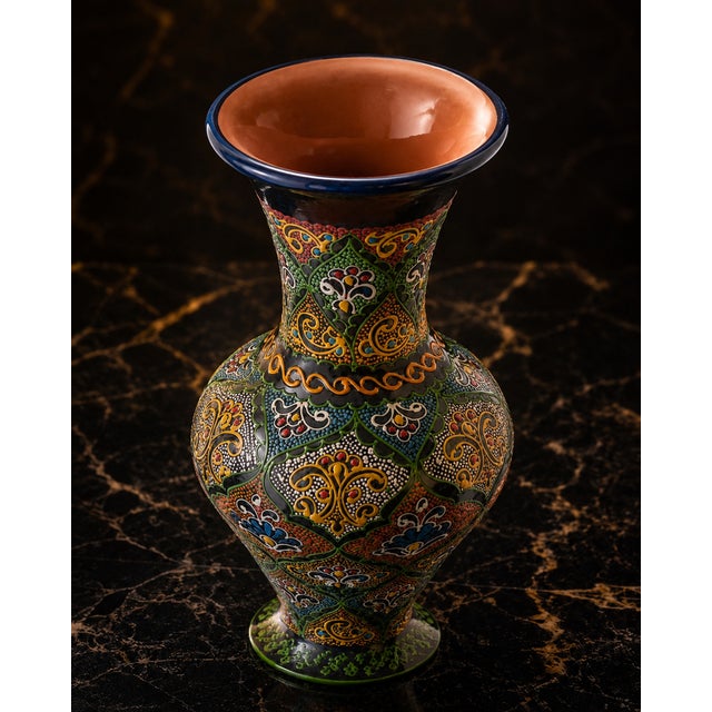 A large hand-painted Uzbek ceramic vase presented as part of the Silk Road Ceramic House Collector Experience. This richly...