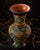 A large hand-painted Uzbek ceramic vase presented as part of the Silk Road Ceramic House Collector Experience. This richly...