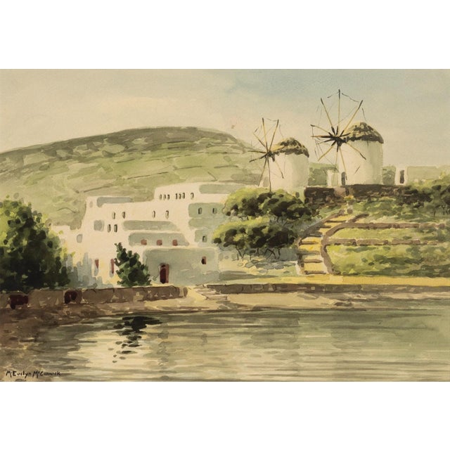 An Impressionist watercolor on paper capturing the iconic whitewashed windmills of Mykonos, Greece by American artist M....