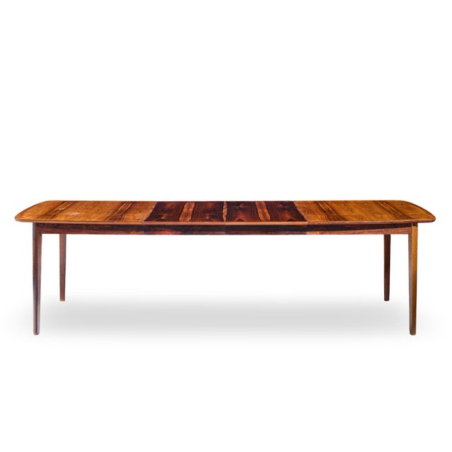 Westnofa Mid Century Norwegian Rosewood Hidden Leaf Expanding Dining Table This table measures: 65.75 wide x 40 deep x...