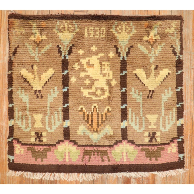 Finnish rya/rug was designed by Aksel Wilhelm Raitio in 1930. The coat of arms of Finland is a crowned lion Details rug...