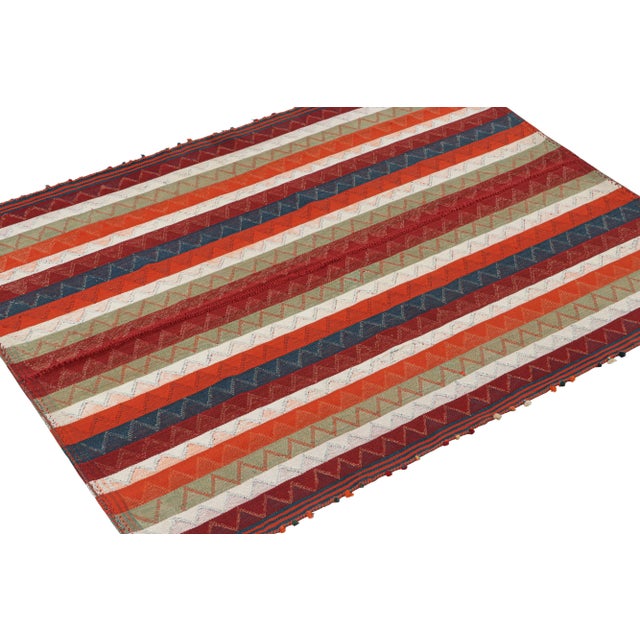This vintage 5x7 Persian tribal kilim is handwoven in wool, and originates circa 1950-1960. This design remarks the panel-...