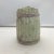 A charming vintage hand-painted bundled asparagus ceramic canister.