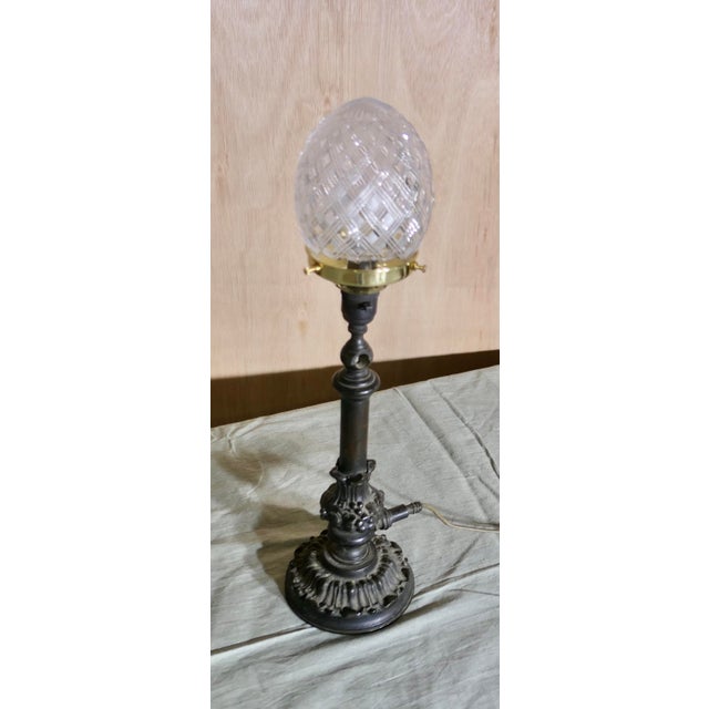 Victorian Bronze Lamp with Diamond Cut Crystal Shade A Charming bronze lamp, the lamp has been converted from an original...