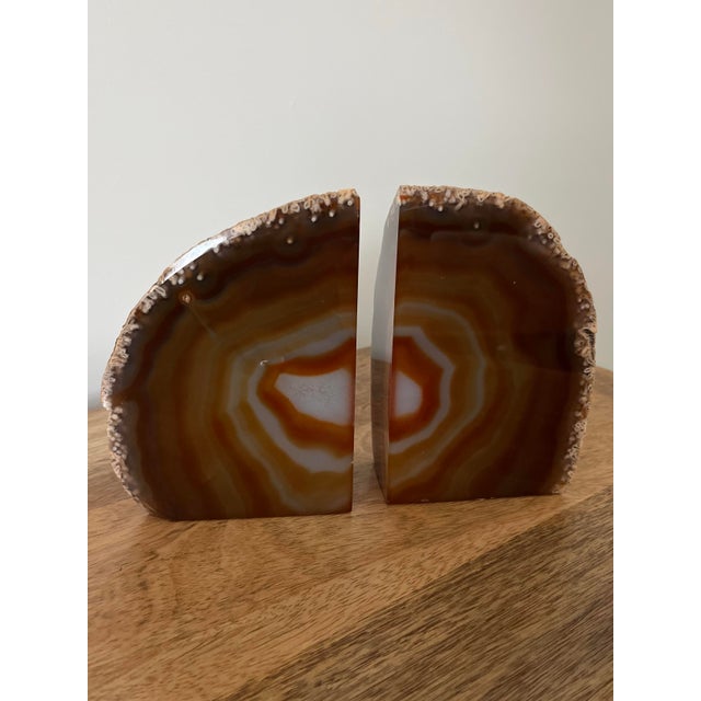 Beautiful pair of natural agate geode bookend polished to reveal the gorgeous layers of color within. Sculptural and...