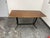 Design Plus Gallery presents the 1930's Italian Design Dining Table. The rectangular wood-grain top has softly rounded...