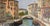 This charming oil on canvas painting captures a quintessential Venetian scene, featuring a tranquil canal with traditional...