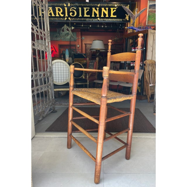 This fantastic early American cashier’s chair almost sits like a bar stool. It has a great stylish look to it and is also...