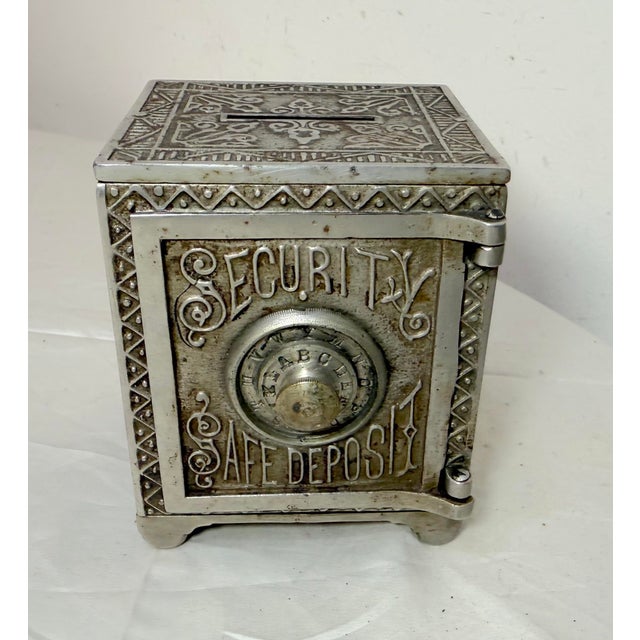 Up for sale is a wonderful antique 19th century cast Iron Security Safe Deposit still bank dated 1988. It is a unique and...