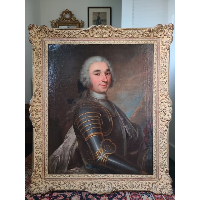 Exceptional 18th century oil painting of a gentleman in armor. The medium is oil on canvas. The canvas has been relined....
