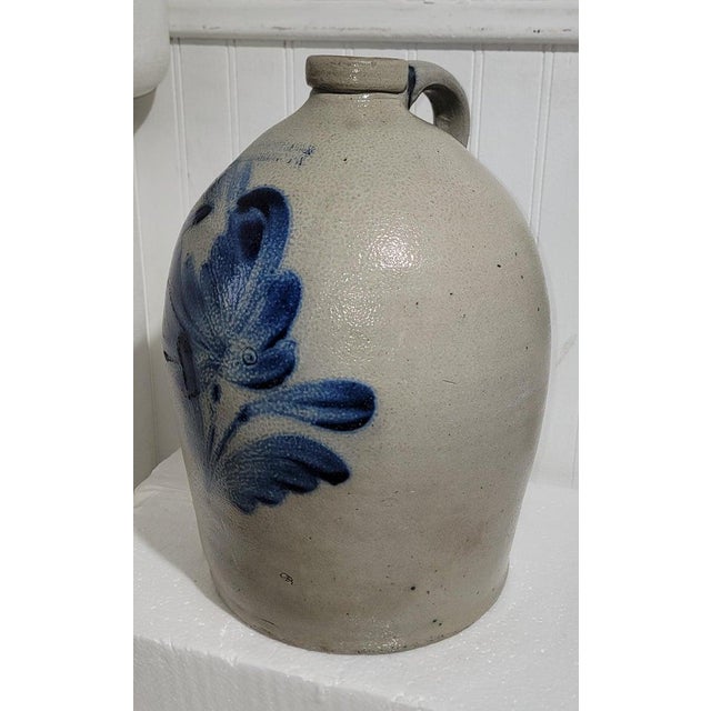 19Thc Early decorated stoneware jug from Cowden & Wilcox of Harrisburg,Pennsylvania in fine condition.This highly...