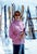 Zermatt Ski Fashion by Toni Frissell A colourful skier has her portrait taken at the bottom of the slopes in Zermatt,...