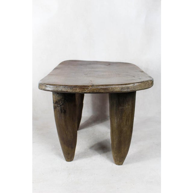 Discover the Timeless Elegance of the Senufo Stool Elevate your living space with the authentic charm of the Senufo Stool,...