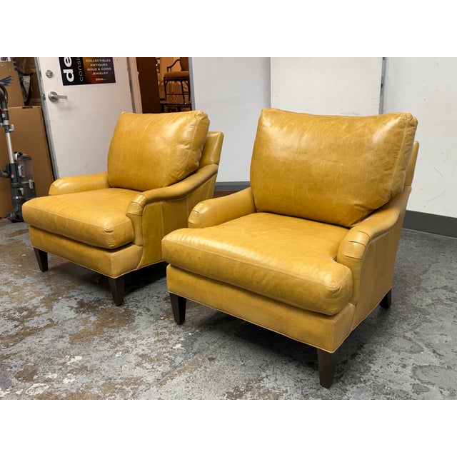 Design Plus Gallery presents a Pair of Tampa Fawn Leather Armchairs from Lee Industries. These chairs (Model L1563-41) are...