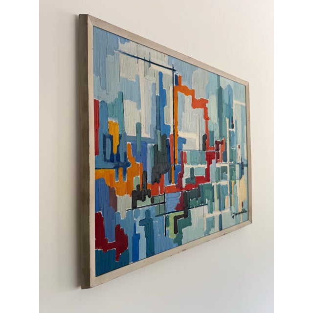This is a vibrant midcentury geometric landscape painting on canvas signed “Janotta”. With heavy impasto brushstrokes, the...