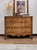 A beautifully crafted 1994-1997 Ethan Allen Legacy Collection French Provincial chest featuring an elegant serpentine...