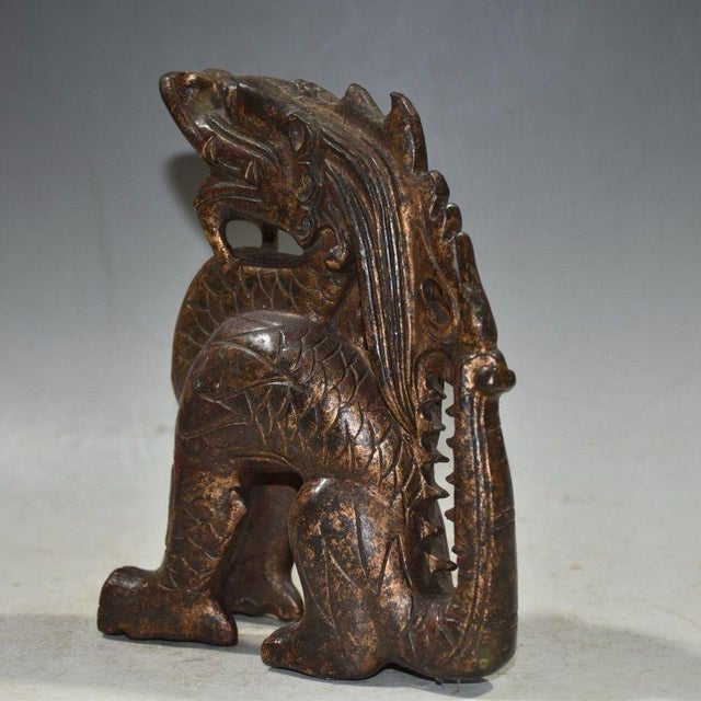 This impressive piece depicts a fantastical creature, likely a stylized dragon or guardian beast (such as a Pixiu or...