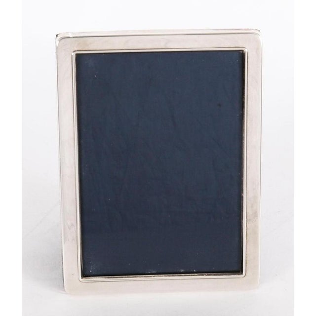 A truly superb decorative sterling silver photo frame with maker's mark RC for Carrs of Sheffield Ltd, and hallmarks for...