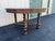 A newly refinished antique Quartersawn oak extension dining table. 54" round with a 10" leaf, this dining table is...