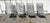 Set of 4 Lounge Chair Click System sun loungers. Metal frame, grey resin straps, and wooden armrests. In used condition....