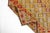 This is a vintage Turkish Oushak rug from the Mid 20th Century. The piece was hand-knotted.