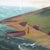 This antique oil on board painting, dating to approximately 1900, depicts a serene seascape in the style of the Hudson...