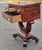 An Empire Mahogany Work Table, dating from the early 19th century. Key features include: Material: Constructed from solid...