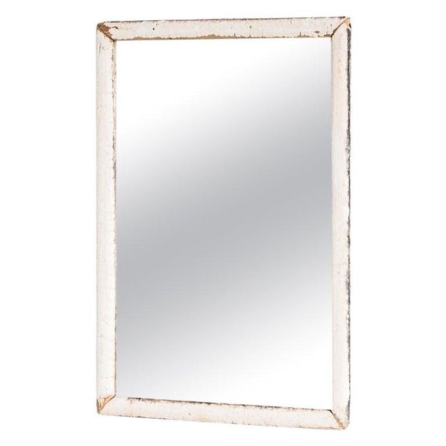 Elevate your décor with the timeless allure of this 1900 French Wood Patinated Mirror. Adorned in an elegant white patina,...