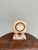 Straight out of a storybook — the kind of little clock you half expect to start talking to you. Carved from solid...