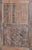 A striking antique carved wood door designed for versatile use as either a hinged entry door or sliding barn door. Hand-...