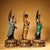 This exceptional set comprises three gilt bronze figures representing the Western Trinity (Amitabha Buddha flanked by the...