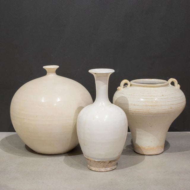 ABOUT Farmhouse old world style hand thrown white milk ceramic vase. Beautiful displayed in groupings of many shapes and...