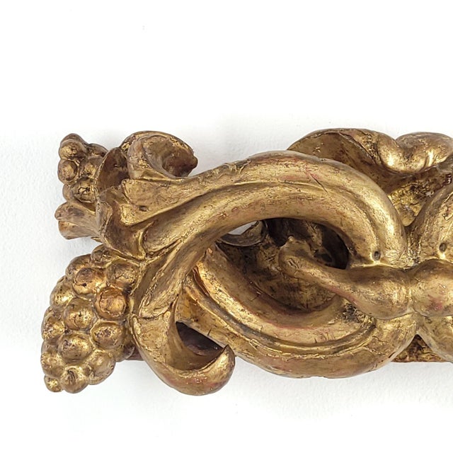 A bold large-scale Baroque giltwood carving.