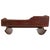 Antique folk art wooden doll cradle, attributed to circa 1860, with a red-painted finish and hand-stenciled decoration....