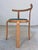 This armchair from the 8000 series is an outstanding classic of Danish furniture design, created by the duo Rud Thygesen &...