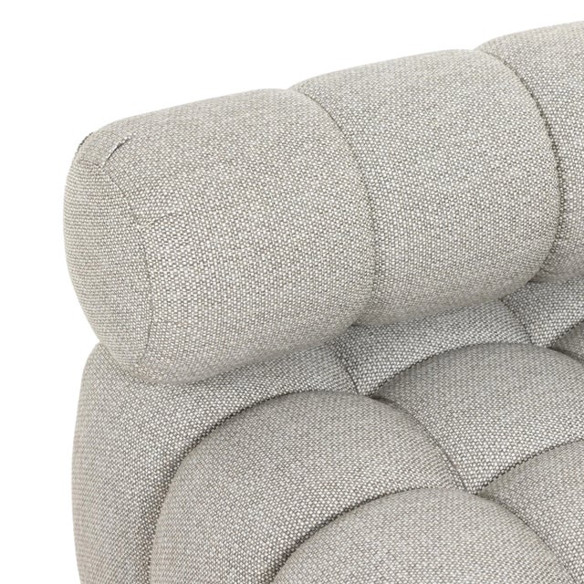 A modern take on mid-century Italian design, soft volume and exaggerated proportions fuse for a sculpted look and playful...