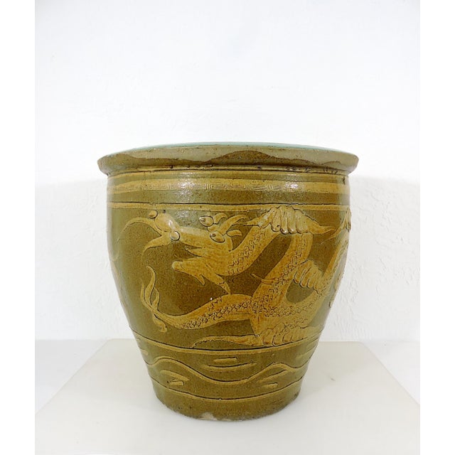 Early 20th Century Glazed Chinese Ceramic Egg Pot With a "Four Clawed