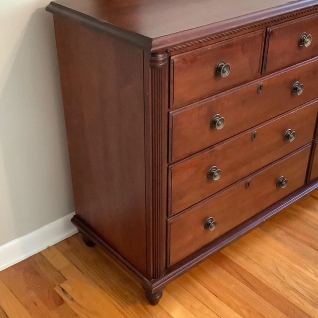 Since 1899 Durham Furniture has produced solid cherry furniture. Plantation mirror Measures 41 inches high, 52 inches wide...