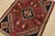 An authentic vintage tribal Shiraz rug hand-knotted with fine wool and natural dyes. This nomadic rug features a central...