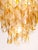 A spectacular Italian Mazzega multi-tier chandelier featuring cascading layers of hand-blown amber and clear glass. Each...
